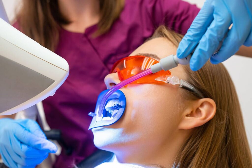 Why do dentists use UV/blue light on teeth during bonding