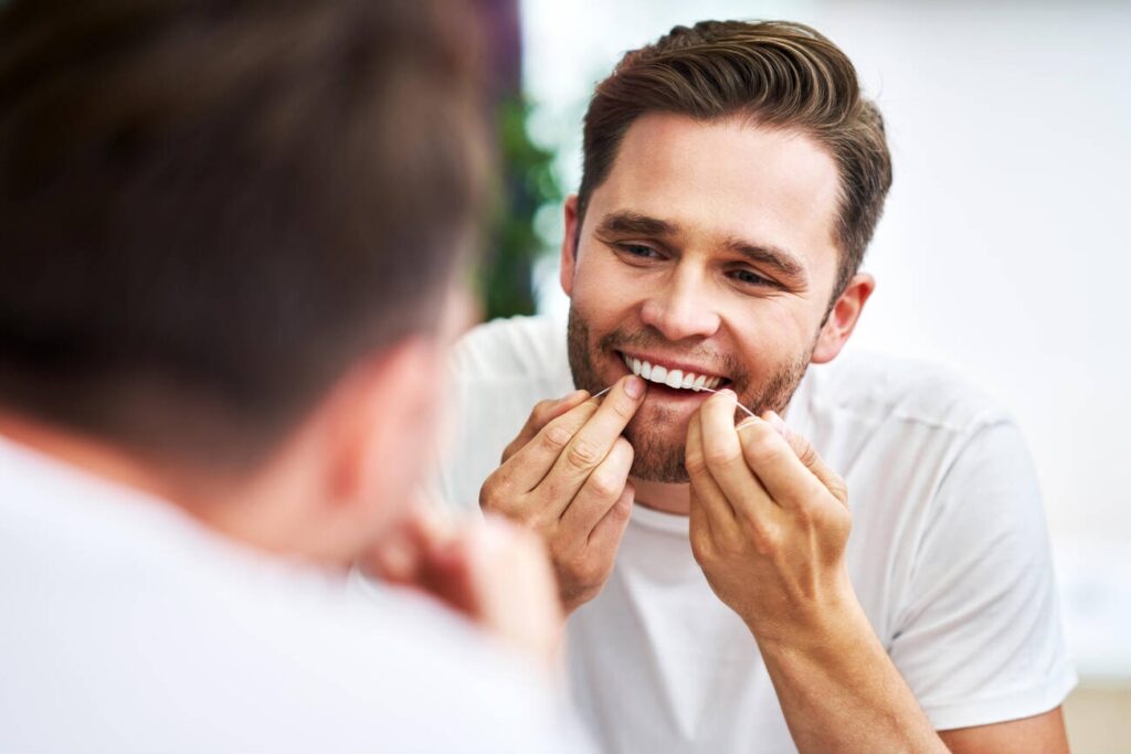 Should You Floss Before or After Brushing?